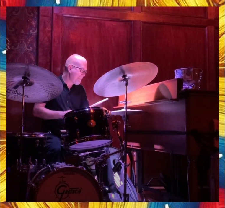 Aaron Serfaty playing drums.