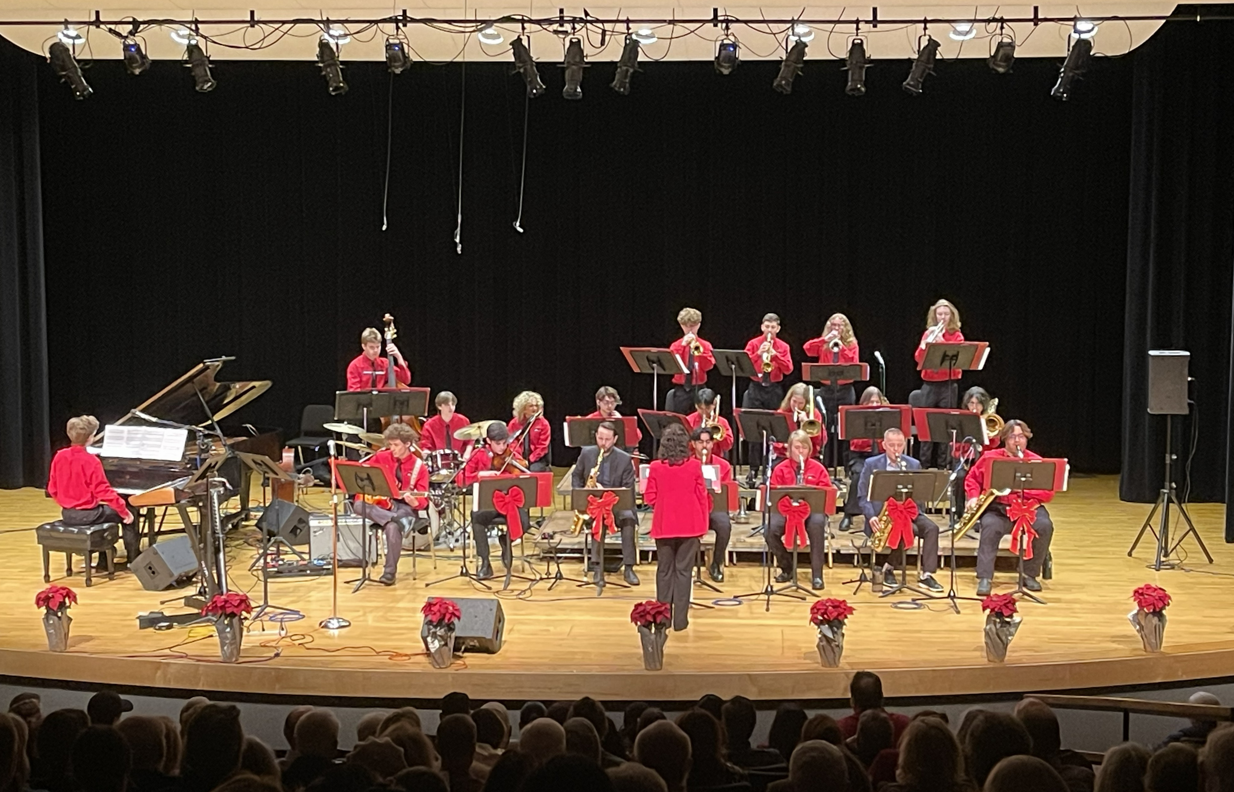 students on stage playing music